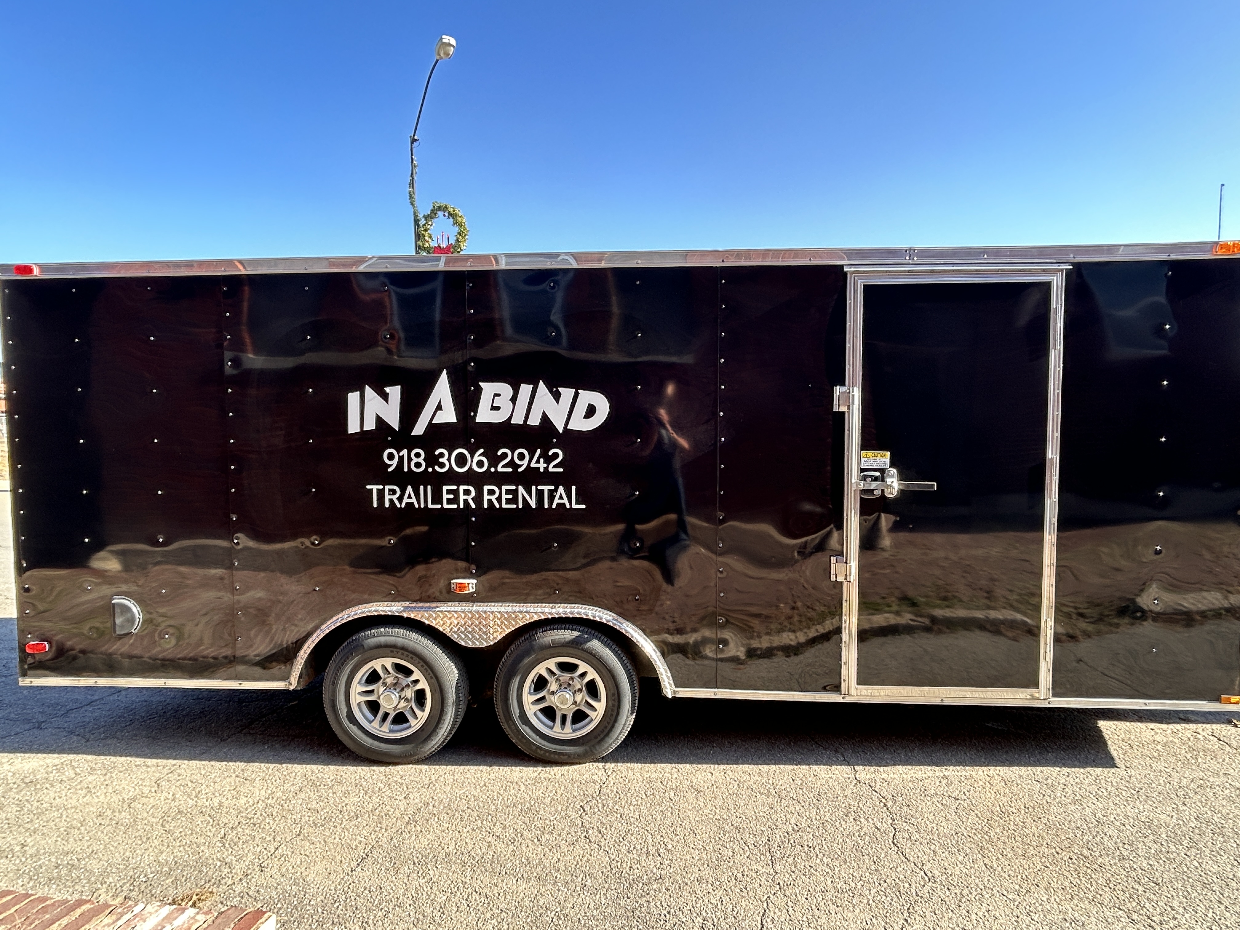 Enclosed trailer for secure and weather-protected hauling in Cushing